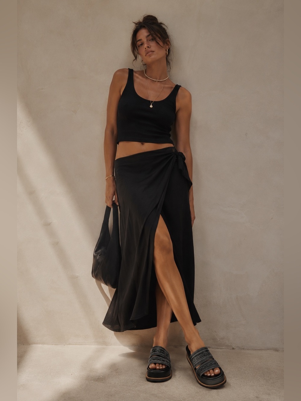 Kelsi Dagger Brooklyn Drift platform slide sandals in black leather featuring 7